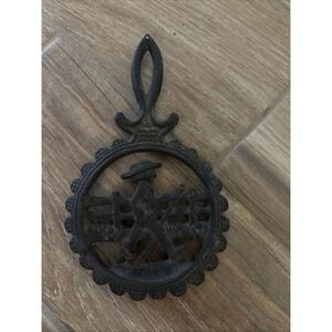 Vintage Black Cast Iron Country Farmer Boy Trivet‎ - 8" x 4.5"